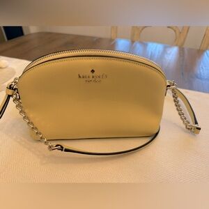 Kate Spade small dome yellow crossbody bag NWOT.